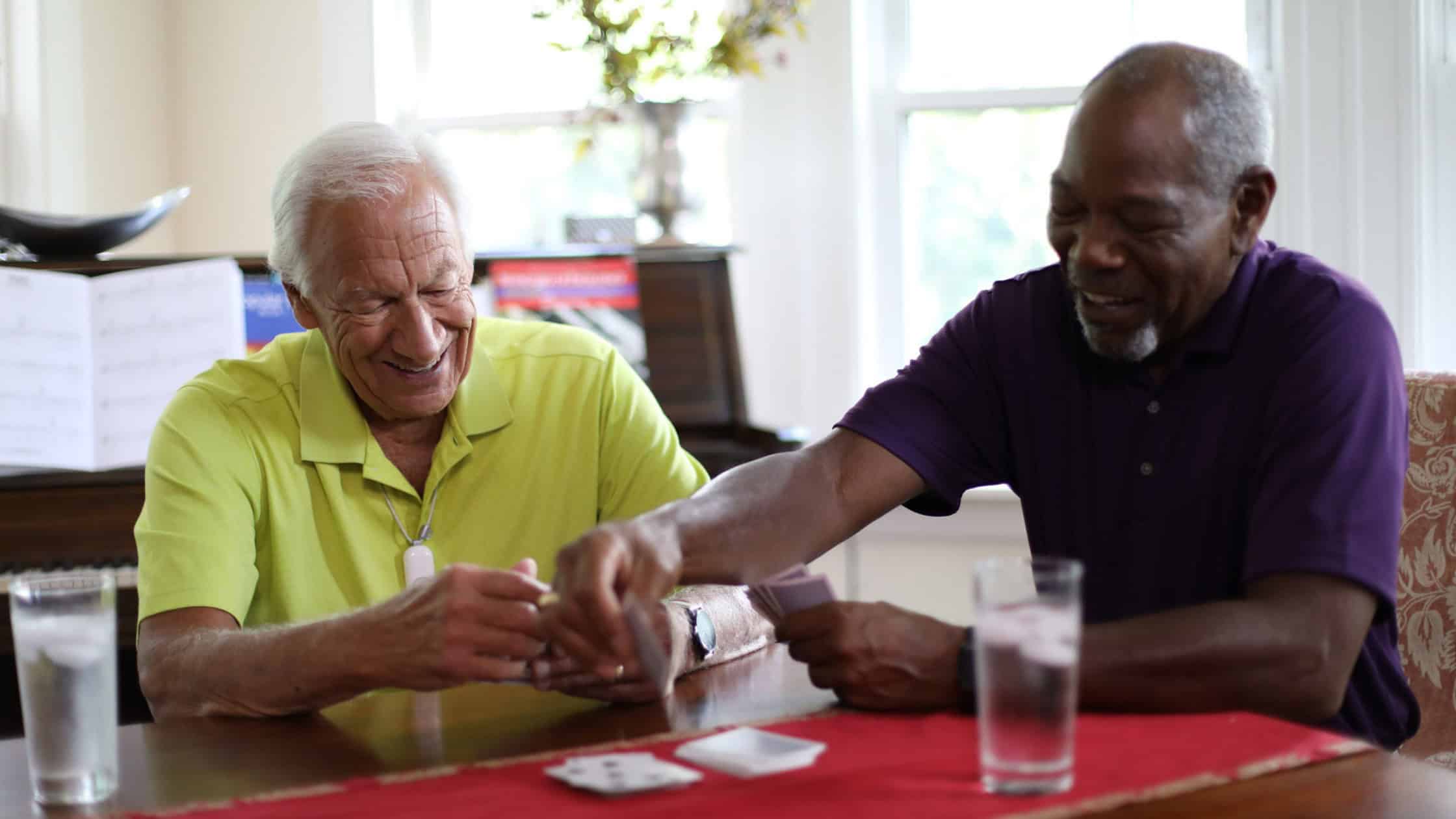 two older men playing cards