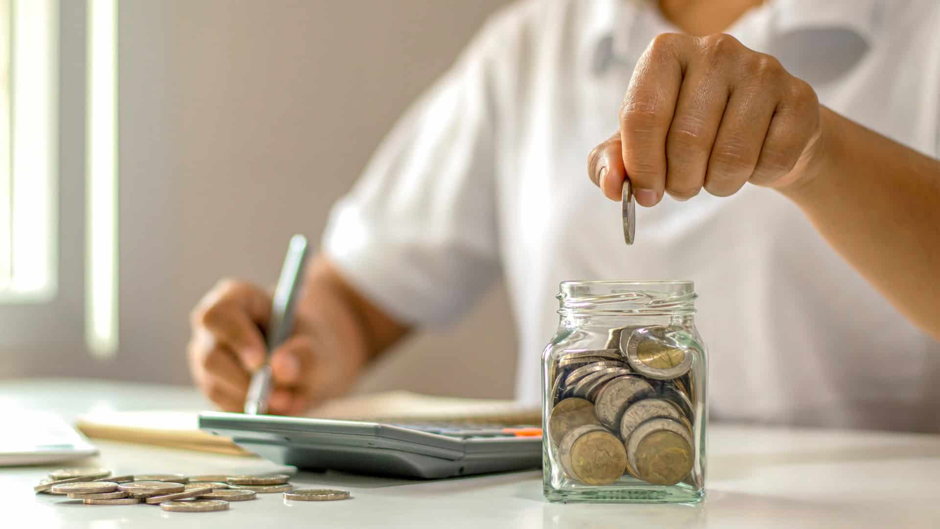 Person counting coins