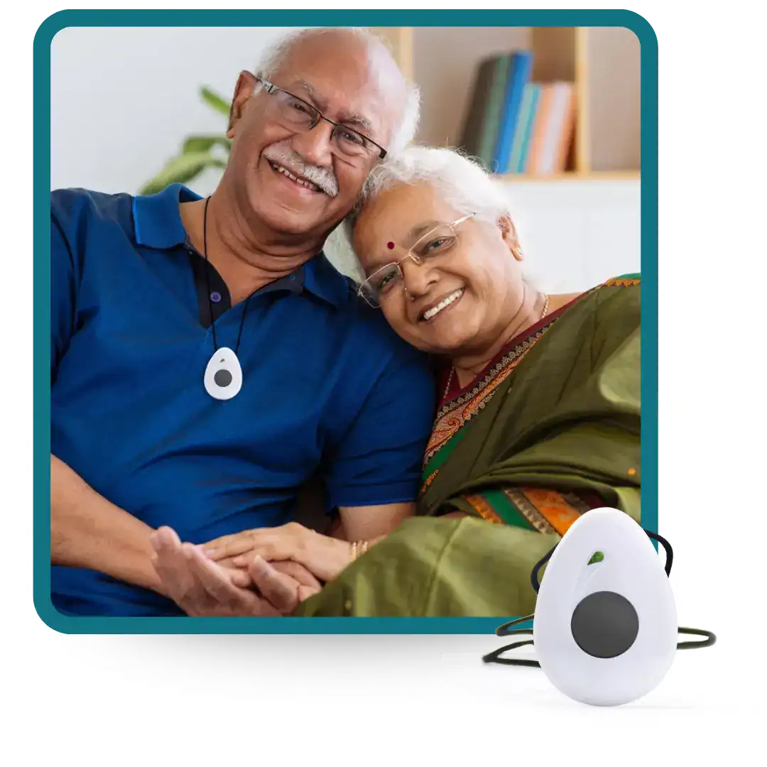 Man next to wife wearing HomeSafe with Fall Detection